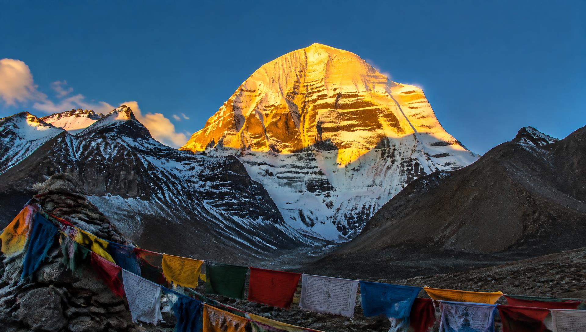 Mount Kailash at sunrise with prayer flags